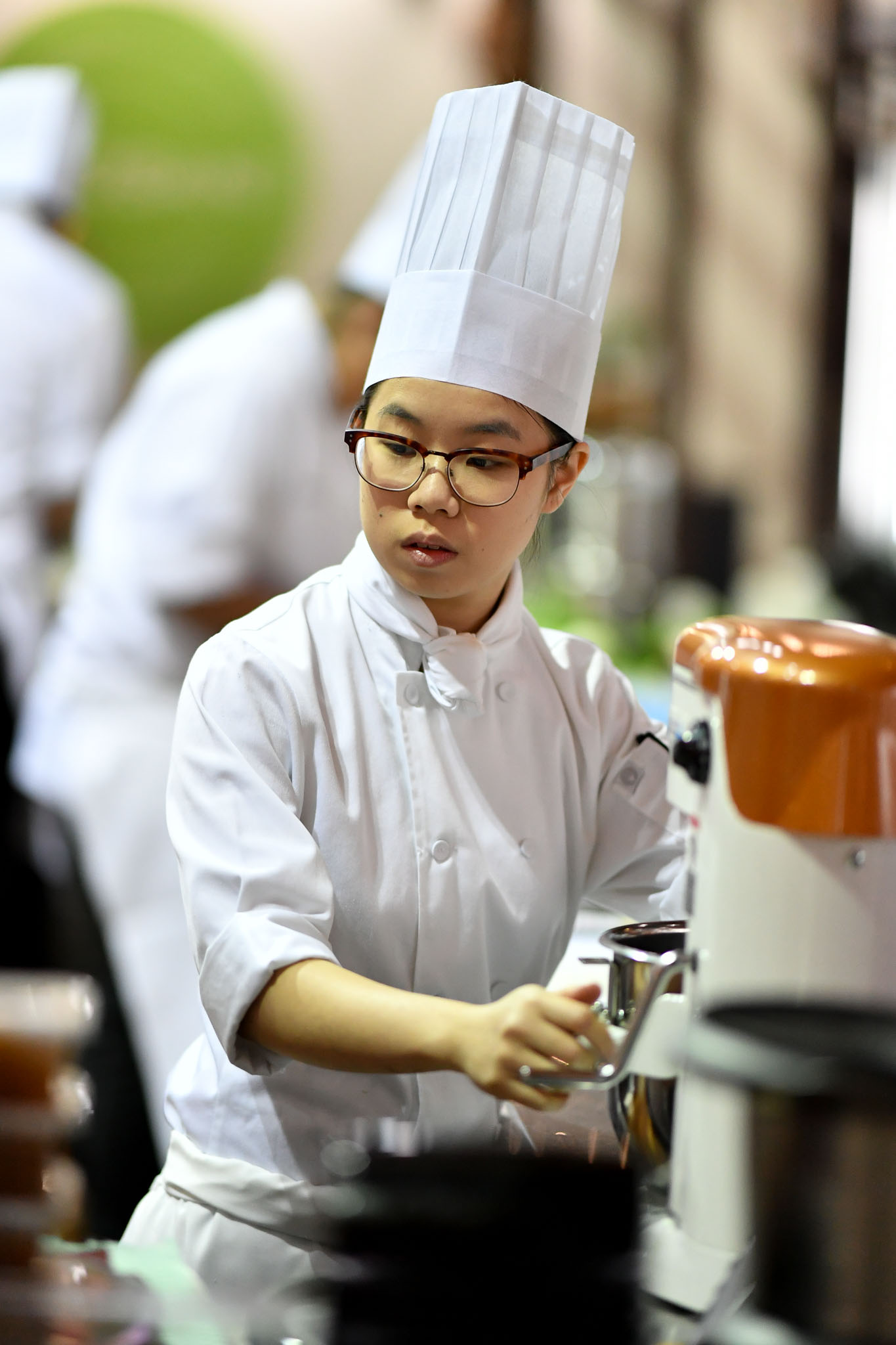 Melbourne, 30 May 2017 - Kimberly Tang commis chef assisting Daniel Soto of the Montague Hotel in South Melbourne in action at the Australian selection trials of the Bocuse d'Or culinary competition held during the Food Service Australia show at the Royal Exhibition Building in Melbourne, Australia. Photo Sydney Low