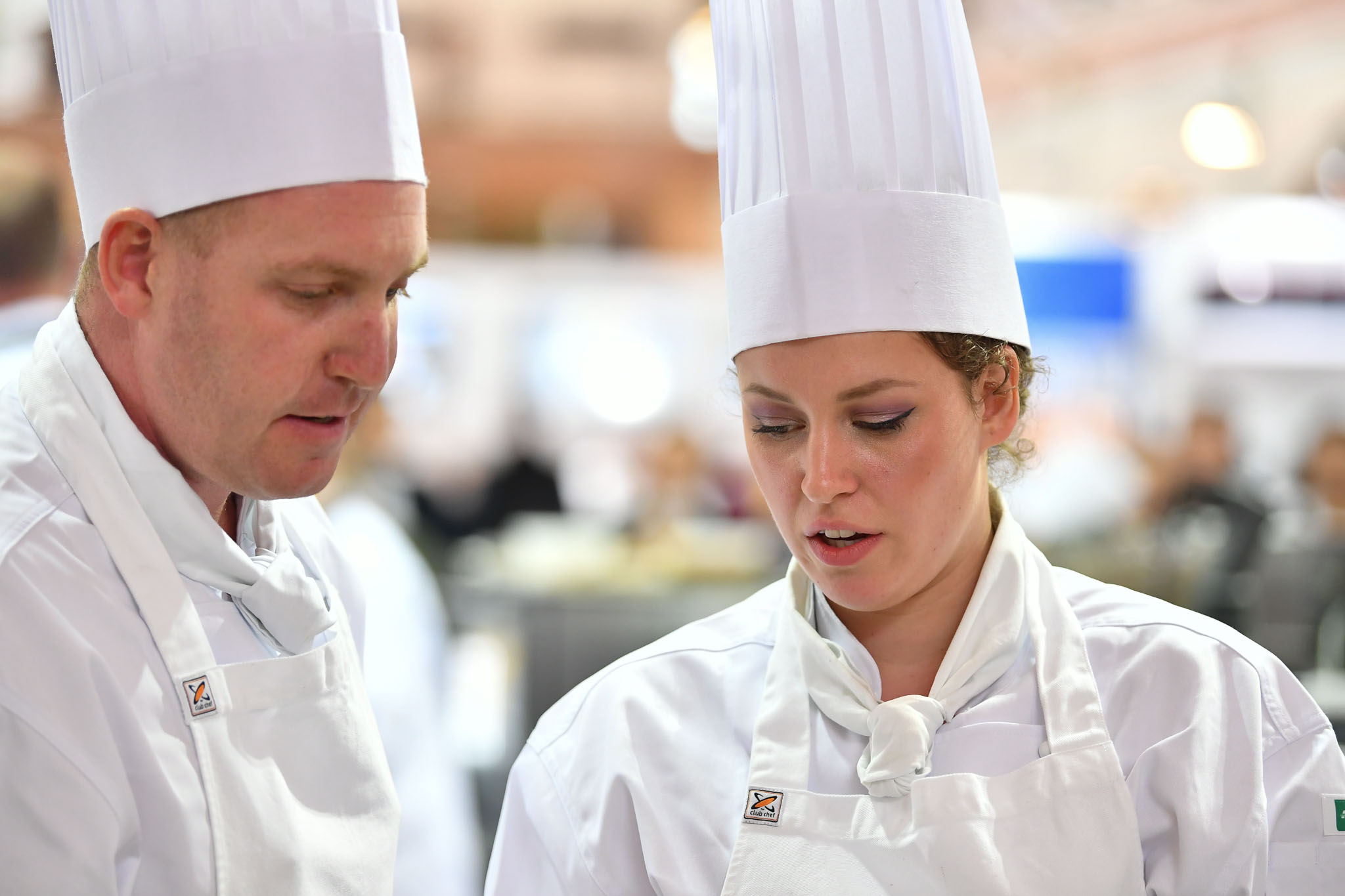 Melbourne, 30 May 2017 - Michael Cole and commis chef Laura Skvor of the Georgie Bass Café & Cookery in Flinders in discussions at the Australian selection trials of the Bocuse d'Or culinary competition held during the Food Service Australia show at the Royal Exhibition Building in Melbourne, Australia. Photo Sydney Low
