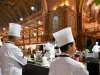 Melbourne, 30 May 2017 - The kitchen invigilators Glenn Flood from the ALH Group, John McFadden from the Parkroyal Hotel Darling Harbour, and Karen Doyle from Le Cordon Bleu watch the competitors at the Australian selection trials of the Bocuse d'Or culinary competition held during the Food Service Australia show at the Royal Exhibition Building in Melbourne, Australia. Photo Sydney Low